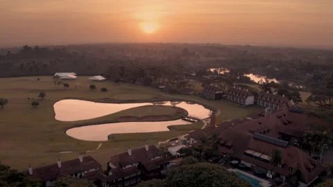 Aerial pull over Windsor Golf Hotel at sunrise in Nairobi Video stock 137286350