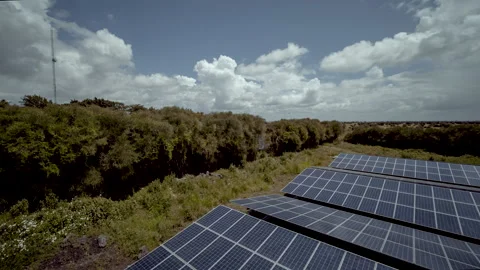 Aerial pull revealing off grid solar panels 스톡 동영상 132022455