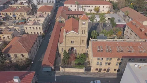 Aerial Pullback and Ascending Shot Revealing Church and City in Mersin, Turkey Stock Footage 327843556