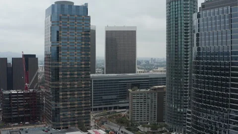 Aerial pullback cinematic shot of Century City downtown buildings and towers LA Stock Footage 273744265