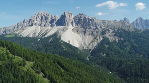 Aerial pullback of Dolomites in South Tyrol. Flying over Forest Stock Footage 131992914