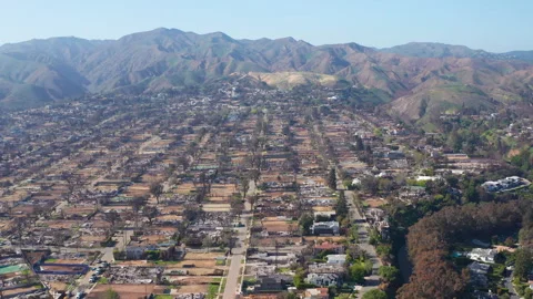 Aerial pullback drone shot of Pacific Palisades Los Angeles California  Stock Footage 308185211