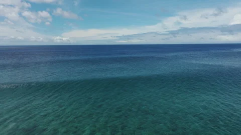 Aerial Pullback Follows Powerful Wave Crashing Over Fringing Reef, Rarotonga Stock Footage 299329710