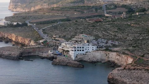 Aerial Pullback of Ghar Lapsi Coastal Landmark Before Storm Damage in Malta 動画素材 329209640