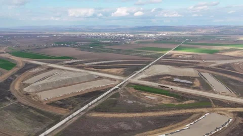 Aerial Pullback of Highway Interchange Construction near Pașcani Romania A7 A8 Stock Footage 333487863