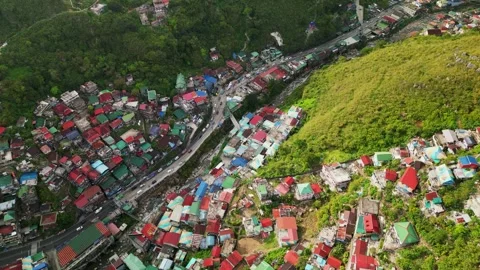 Aerial Pullback of Hillside Homes Artwork at Valley of Colors, La Trinidad Видео 329284554