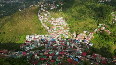 Aerial pullback of hillside village at Valley of Colors, Baguio, Philippines Stock Footage 332820744