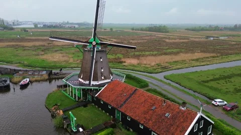 Aerial Pullback of Historic Windmill in Zaanse Schans Netherlands Stock Footage 331272370