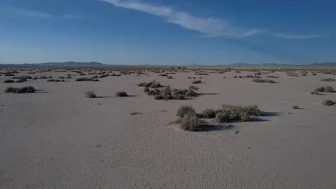 Aerial pullback of a large dry lake in the New Mexico desert Stock Footage 197091855