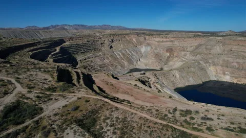 Aerial pullback of a large open pit mine Stock Footage 221145942