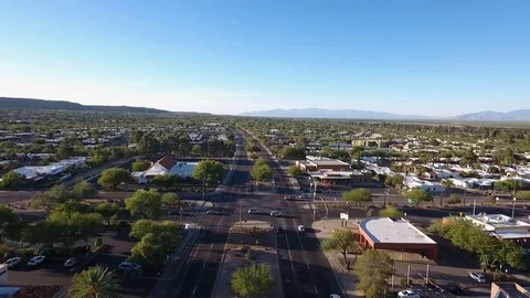 Aerial pullback of the main intersection in a suburban town Stock Footage 78419480