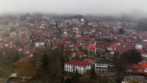 Aerial Pullback of Metsovo Village Red Rooftops in Epirus Greece Stock Footage 331589925
