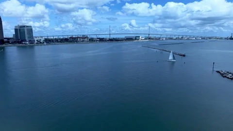 Aerial Pullback Moving Along With Sailboat Revealing Corpus Christi Bayfront Stock Footage 336473631