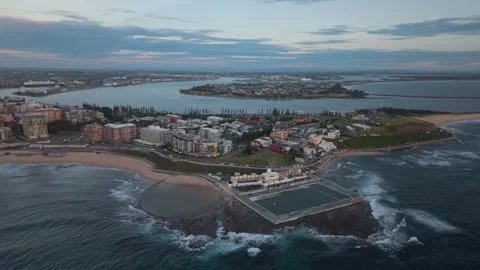 Aerial Pullback from Newcastle Ocean Baths to Stockton, Coastal Scenery at Dusk Vídeos de archivo 301693827