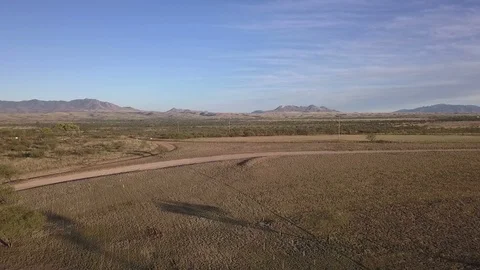 Aerial pullback of an old run-down barn on a rural ranch Stock Footage 97650928