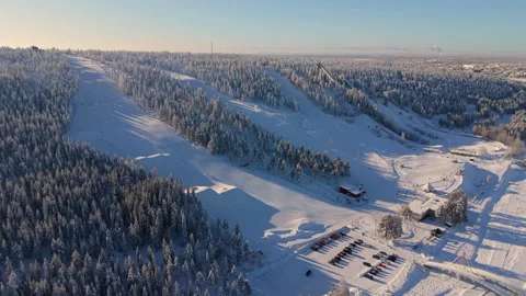 Aerial Pullback from Ounasvaara Ski Resort in Rovaniemi - Sunny Day Stock Footage 331985019