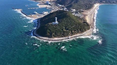 Aerial Pullback Over Cape Irago Lighthouse and Coastline Japan Video stock 342238091