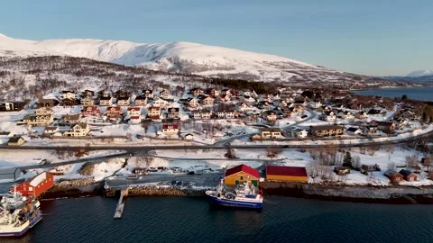 Aerial Pullback Over Eidkjosen Harbor and Residential Area Near Tromsø Norway Stock Footage 331044977