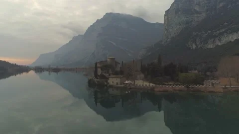 Aerial pullback over Lake Toblino from Castle Toblino / Castello Toblino in 스톡 동영상 144750585