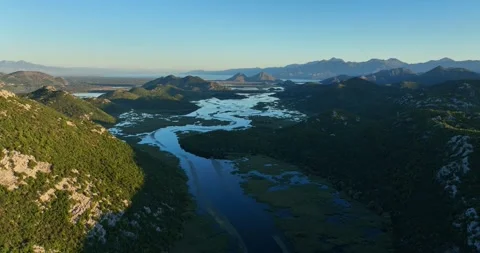 Aerial Pullback Over Skadar Lake With Winding Waterways and Lush Landscape Vídeos de archivo 309203317