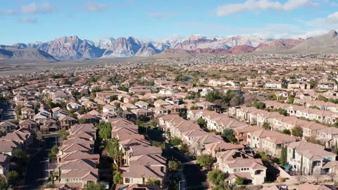 Aerial Pullback over Summerlin Las Vegas with Red Rock Canyon Stock Footage 333114305
