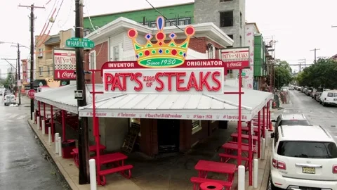 Aerial pullback, Pat's King of Steak, cheesesteak tourist trap in South Stock Footage 137501911