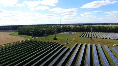 Aerial Pullback Pivot Shot of a Solar Farm Stock Footage 118667395