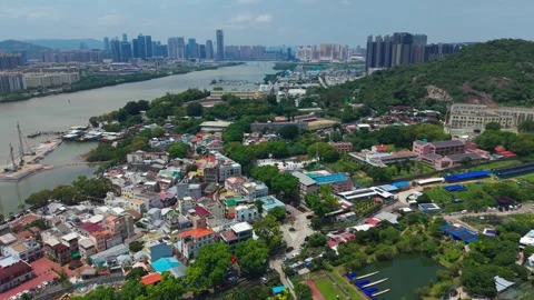 Aerial Pullback Reveal of Coloane Village Macau Skyline 库存影片 340889344