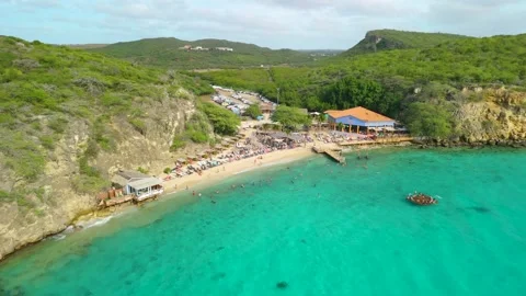 Aerial Pullback Reveal of Crowded Kokomo Beach Curacao Stock Footage 339190826