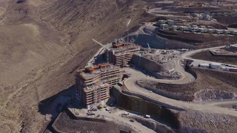 Aerial Pullback Reveal Shot Hillside Construction Cranes in Henderson Vegas Stock-Footage 333724309