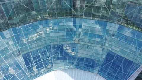 Aerial pullback revealing modern office complex Stock Footage 325328527