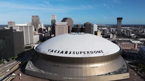 Aerial Pullback Reveals Caesars Superdome Stadium Home of the New Orleans Saints Stock Footage 320558447