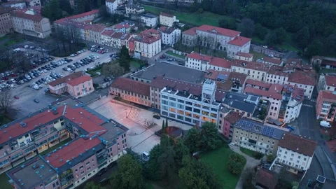 Aerial Pullback with Rotation from Lanificio Conte Revealing Schio Skyline – Stock-Footage 333947503