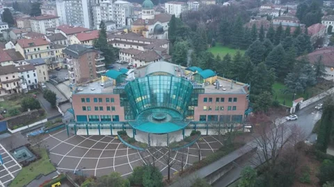 Aerial Pullback with Rotation from Modern Glass Building in Schio, Vicenza Video stock 333940686