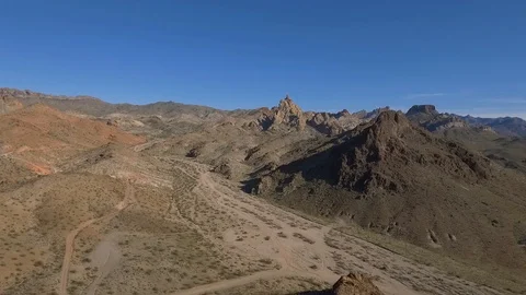 Aerial pullback of rugged mountains in the Arizona desert Stock Footage 123912682