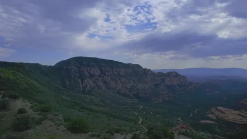 Aerial pullback of a scenic desert valley near Sedona Stock Footage 246016941