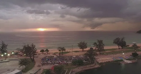 Aerial Pullback Shot Of Electrical Storm At Sunset On Karon Beach, Phuket, Vidéo 80180450