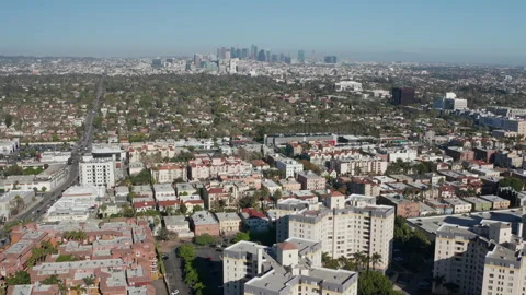 Aerial pullback shot of Los Angeles urban neighborhood and community vibe Stock Footage 272785201
