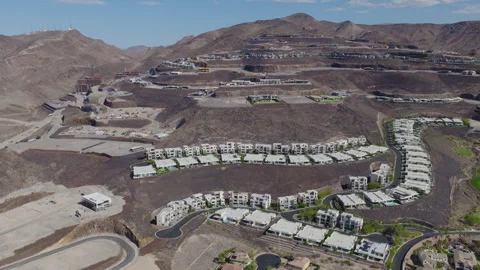 Aerial Pullback Shot of Luxury Hillside Homes in Las Vegas Henderson Stock Footage 333708011