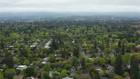 Aerial pullback shot of Menlo Park Silicon Valley in California on a cloudy day Stock Footage 308244543