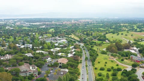 Aerial pullback shot of Menlo Park Palo Alto Stanford Bay Area California suburb Stock Footage 308257957