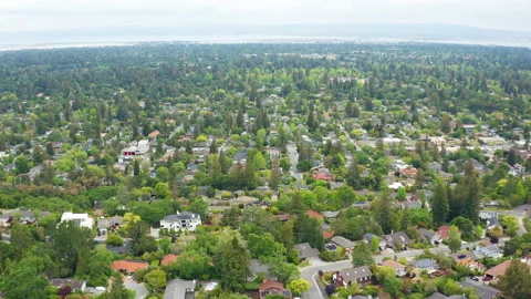 Aerial pullback shot of Menlo Park Bay Area suburban community homes Stock Footage 308258570