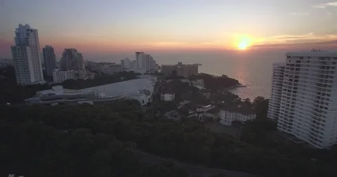 Aerial Pullback Shot Over Headland and Pattaya City Sign Video stock 75774643