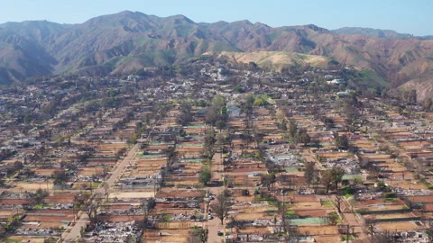 Aerial pullback shot of Pacific Palisades Los Angeles area after the fire Stock Footage 308181256