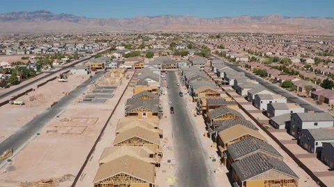 Aerial pullback shot of residential construction area in serene Las Vegas suburb Stock Footage 200857498