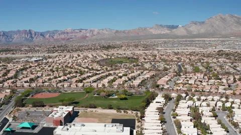 Aerial pullback shot of Summerlin suburban community and residences in Las Vegas Stock Footage 271202869