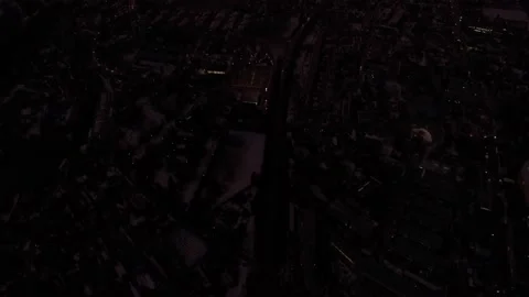 Aerial pullback shot of a town revealing a magical red cloudy sky, backlight Stock Footage 147903121