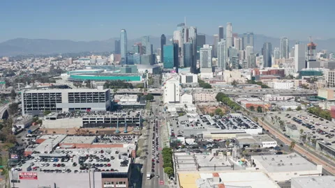 Aerial pullback shot of urban Los Angeles downtown, buildings, car traffic Stock Footage 273753753