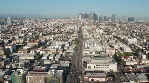 Aerial pullback shot of urban Los Angeles, Koreatown, cars, shops, homes, trees Stock Footage 273756863