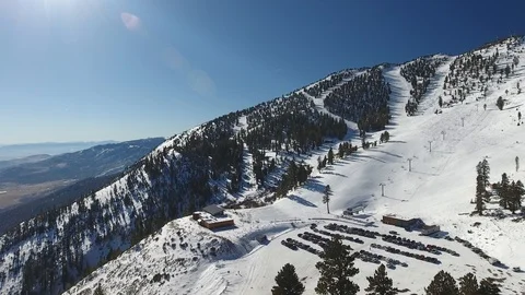 Aerial Pullback of Ski Resort in Winter (4k) Stock Footage 87641408